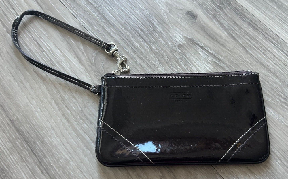 Coach Signature Dark Brown Wristlet- Patent Leather Style and Purple Interior!