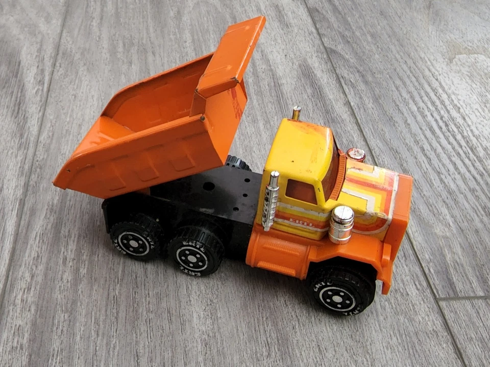Vintage ERTL Pressed Steel / Plastic Dump Powerized Truck Friction Motor Orange - Image 4 of 4