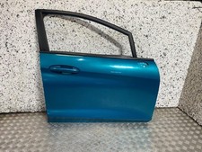 17-22 FORD FIESTA MK8 5 DOOR DRIVER OFF SIDE FRONT DOOR BLUE WAVE (SCRATCHED)