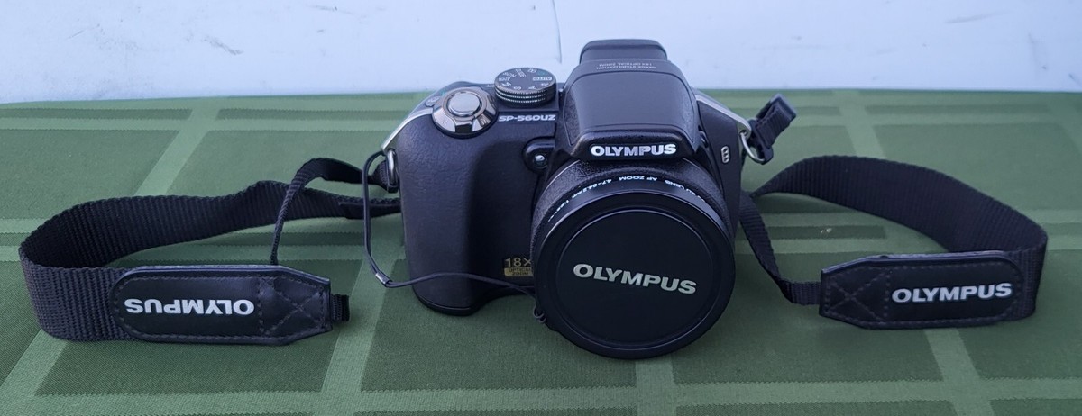 Olympus SP-560UZ 8MP Digital Camera with Dual Image Stabilized 18x