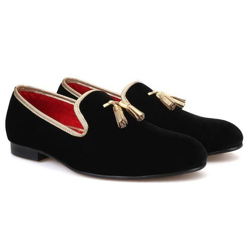 black loafers with gold tassels