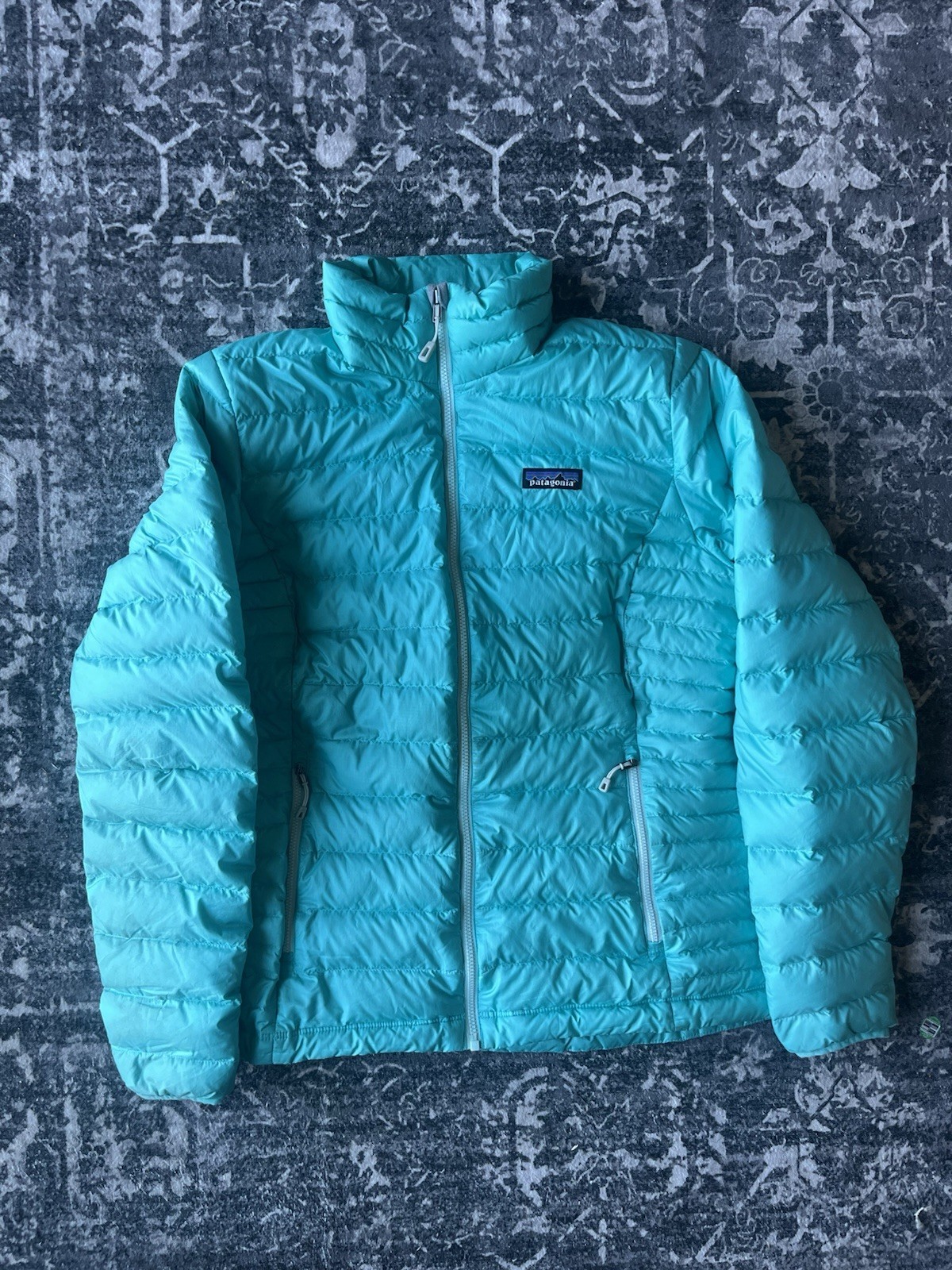 Suéter de plumón Patagonia chaqueta acolchada azul para mujer talla mediana?
