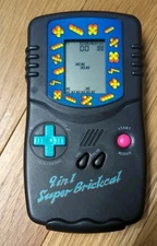 Vintage 9 in 1 Super BrickCal game on one side calculator on other side