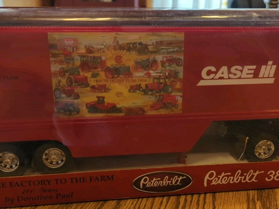 New Ray Peterbilt 387 Case IH From the factory to the farm 100 years Truck 1:32 - Image 2 of 4