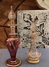TWO ATTRACTIVE EGYPTIAN GLASS PERFUME OR ESSENTIAL OIL BOTTLES Small