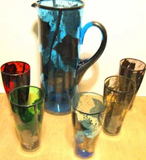 vintage pitcher and assorted color glasses set with  silver leaf overlay