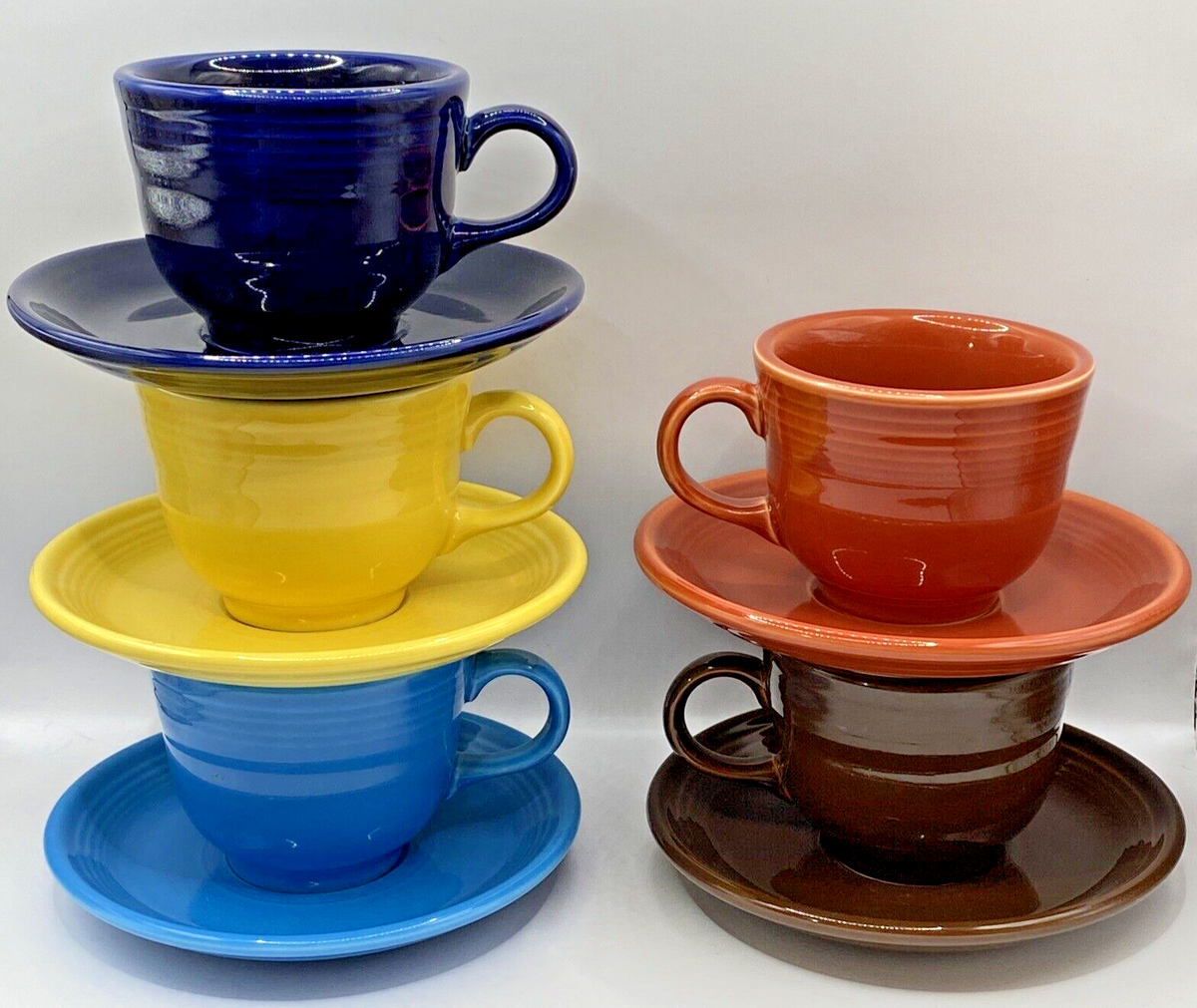 Fiestaware Cups Saucers Sets Brown, Blue, Cobalt Blue, Yellow Brick Red