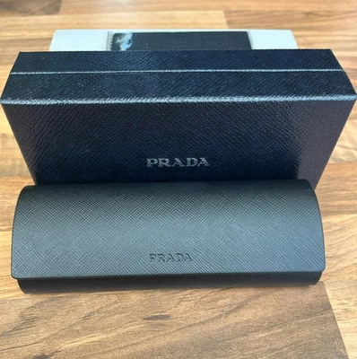 PRADA SLIM SUN/GLASSES HARD CASE, NEW IN SLEEVE, BOX, SEALED CLOTH - BLACK
