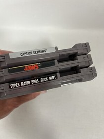 Nintendo NES GAME LOT of 3 Jaws, Captain Skyhawk, Super Mario/Duck Hunt