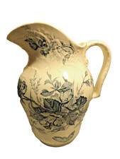 Broc en faïence début XXᵉ siècle – Décor floral bleu – Style romantique