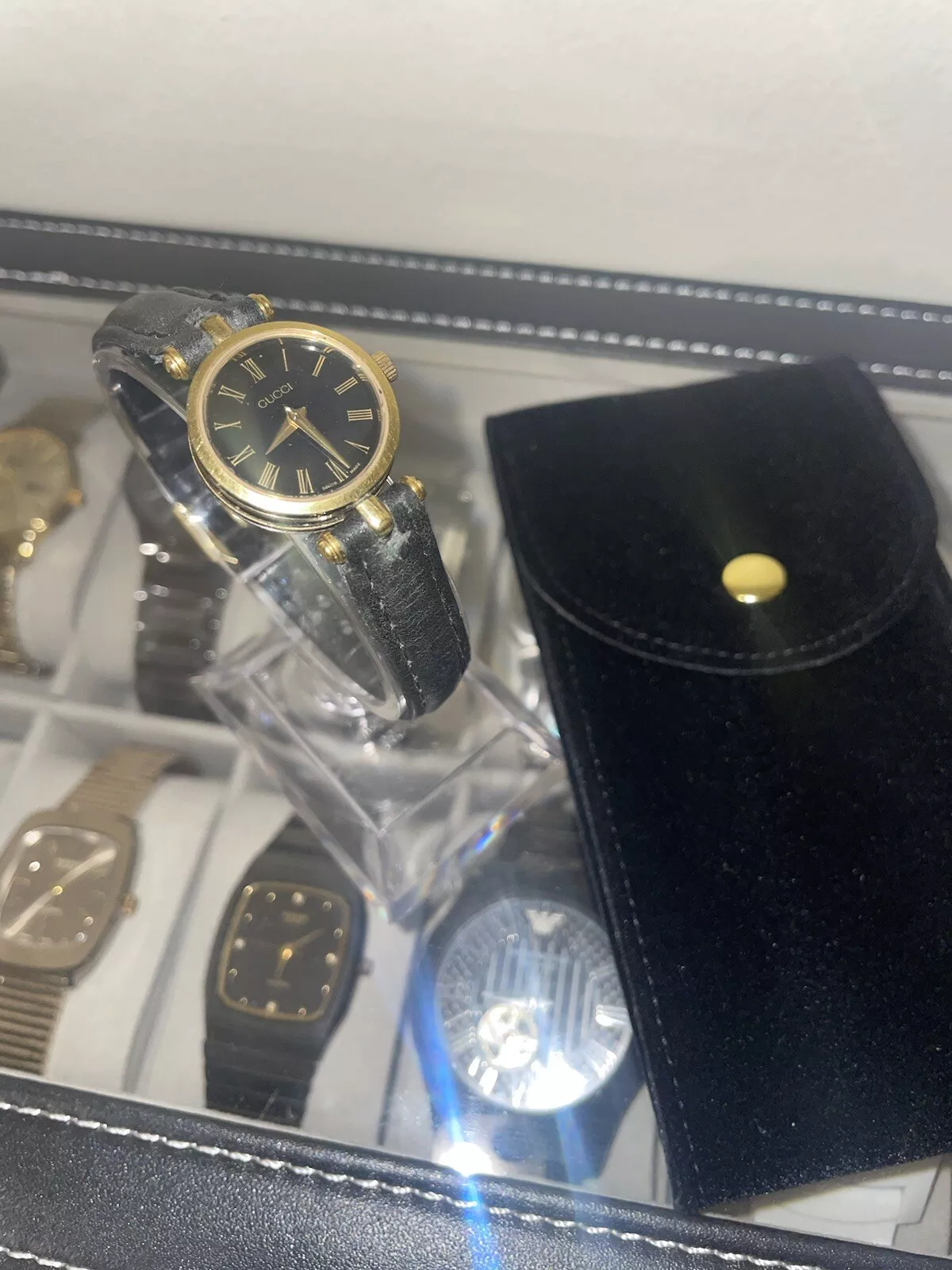 Montre femme Gucci plaqué or 18 carats 22 mm ligne sherry bracelet cuir 2000 L