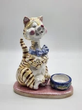 VTG HERCO Bow Tie Cat waiting for food