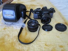 yashica FX-D quarz molto buona! 2 obiettivi , custodia come nuova.Funziona tutto