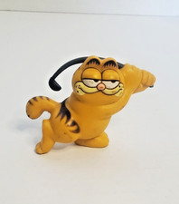 Vintage Garfield the Cat swinging golf club f...