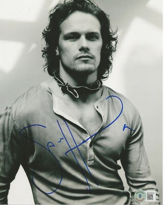 SAM HEUGHAN SIGNED OUTLANDER HUNK 8X10 PHOTO BECKETT BAS COA
