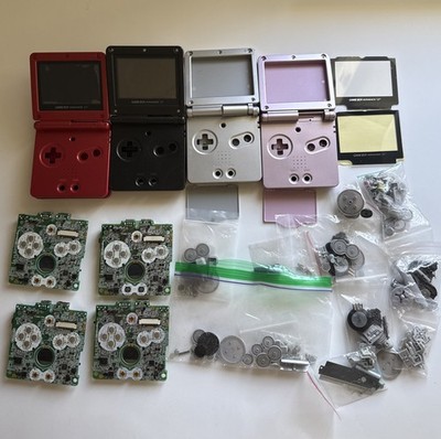 Gameboy Advance SP lot for parts. GBA SP motherboard, OEM shells & parts.