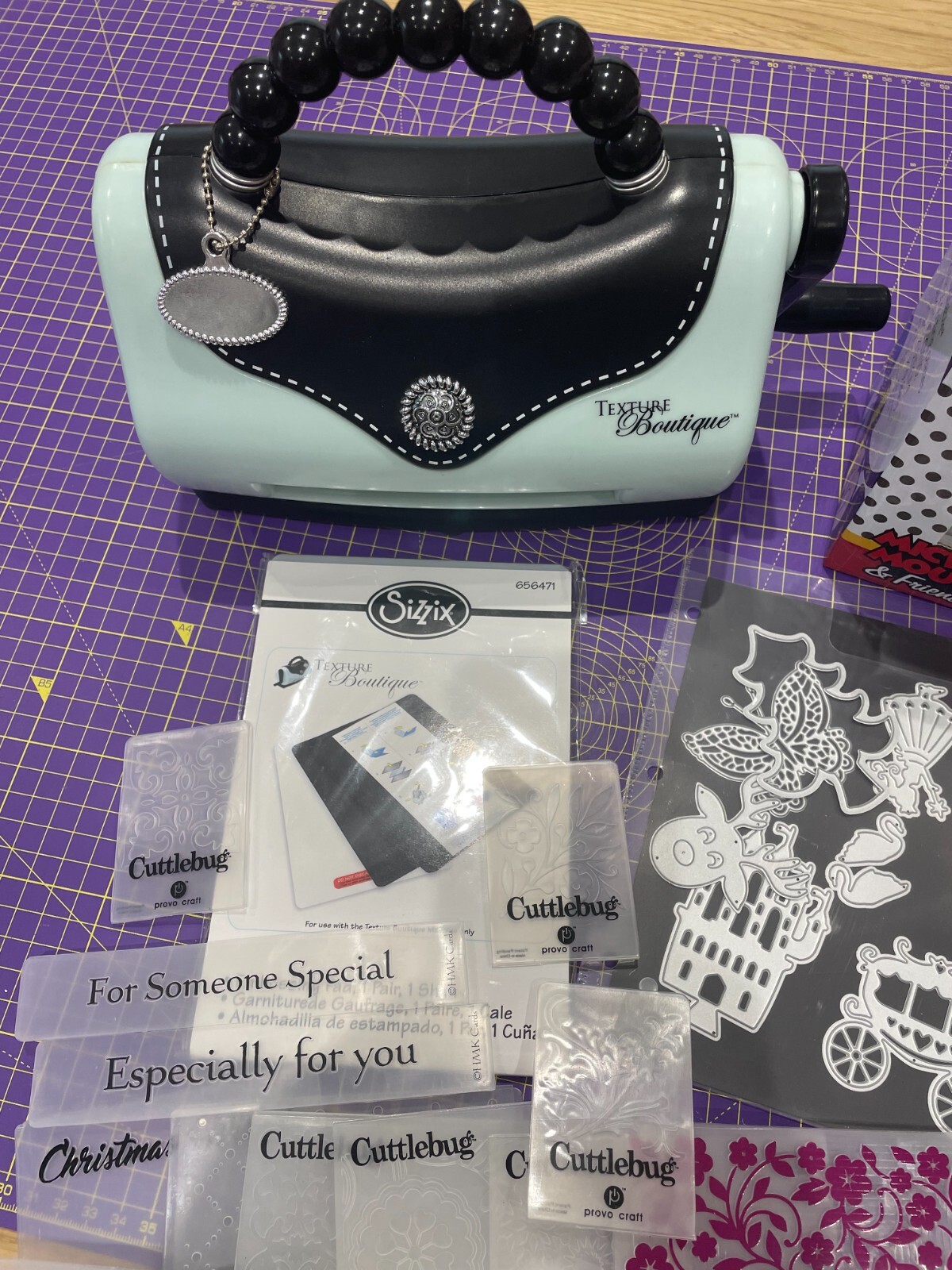 DISNEY DIE CUTTING MACHINE & SIZZIX TEXTURE BOUTIQUE EMBOSSING MACHINE