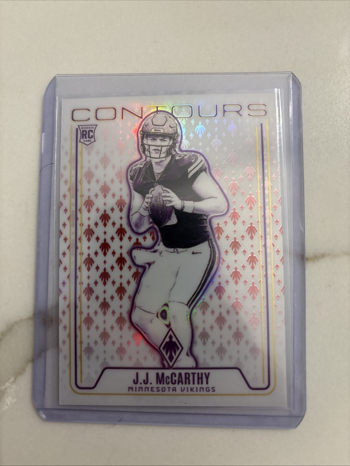 2024 Panini Phoenix - Contours J.J. McCarthy #CON-JMY Red /99 (RC)
