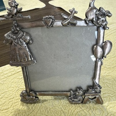 Picture frame, child, hold a 4x4 picture, little animals, shoes, Balloons,  etc 