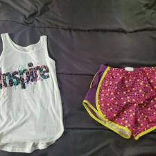 girl med drifit shorts and tank