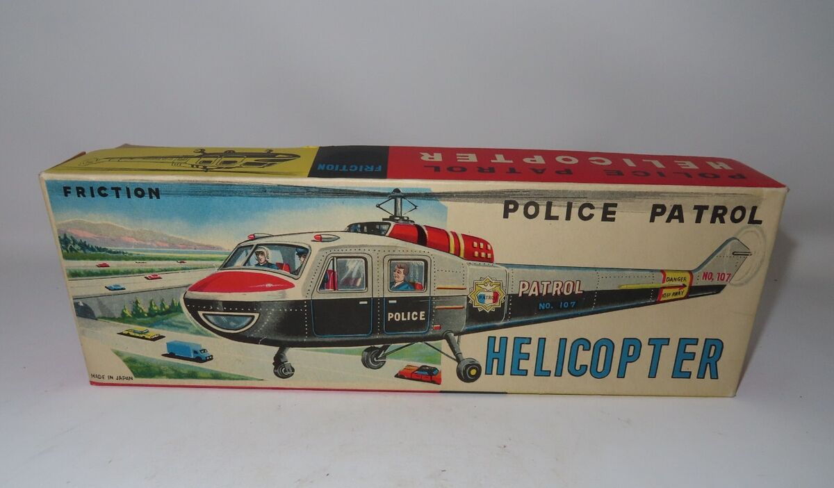 Vintage Friction Tin Toy Police Patrol Helicopter, Made in Vintage Friction Tin Toy Police Patrol Helicopter, Made in