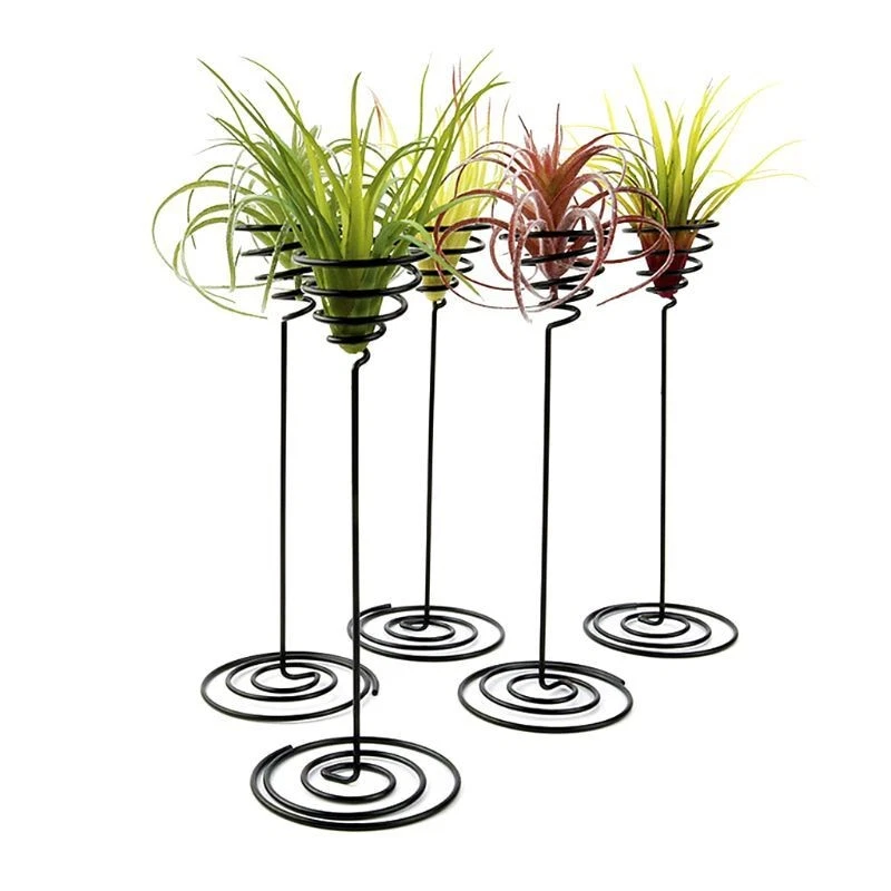 Soporte para maceta de planta con base de piña de aire de hierro negro creativo soporte para bola casera Foto 3 de 4