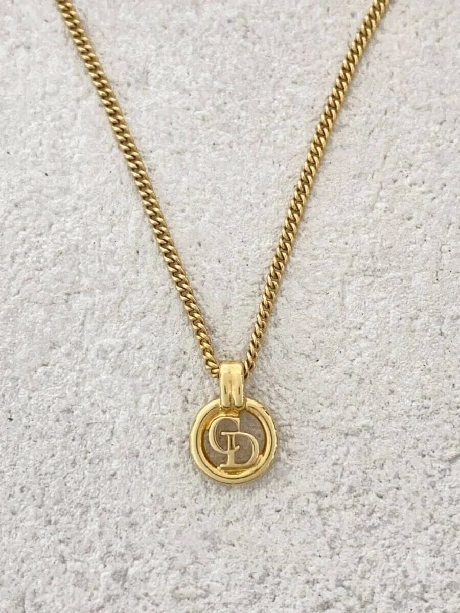 Collier Christian Dior    Doré avec haut femme