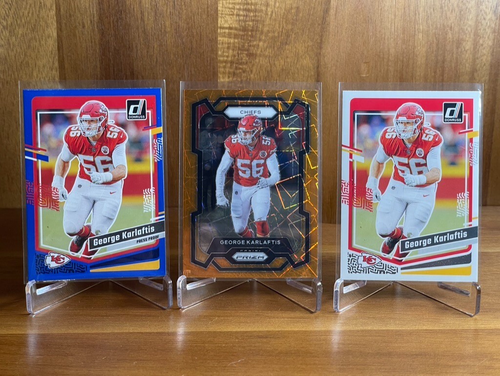 George Karlaftis 2023 Prizm #143 Orange Lazer Orange Lazer + Donruss Press Proof