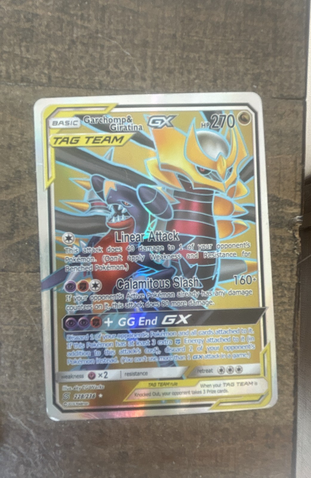 Garchomp & Giratina GX (Full Art) 228/236 Sm-Unified Minds Holo