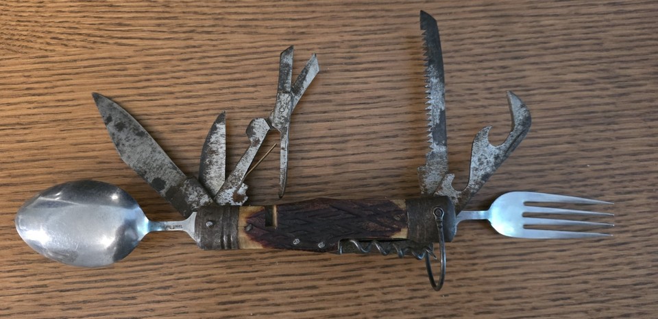 A dead-stock vintage Japanese hobo knife with integrated spoon and fork — the original ultralight camp multi-tool before 'EDC' was even a word.