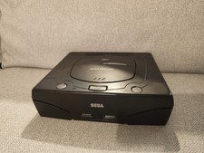 Sega Saturn console, controller, cables and 2 games