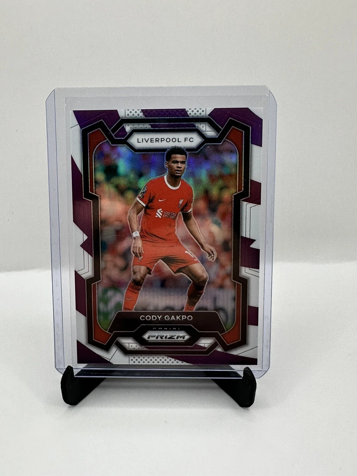 2023-24 Prizm EPL Cody Gakpo Purple and White Stripes /92 Liverpool