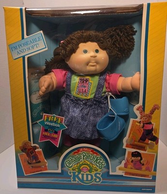 The Official Cabbage Patch Kids  'Kids . Weebok Shoes . Stacey Born October 1st.