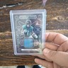 Panini Obsidian Atomic Material Travis Etienne Jr #AM-TET /125 Jaguars 2022