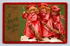 TUCK's Three Girls Sweeping Happy New Year Embossed Postcard