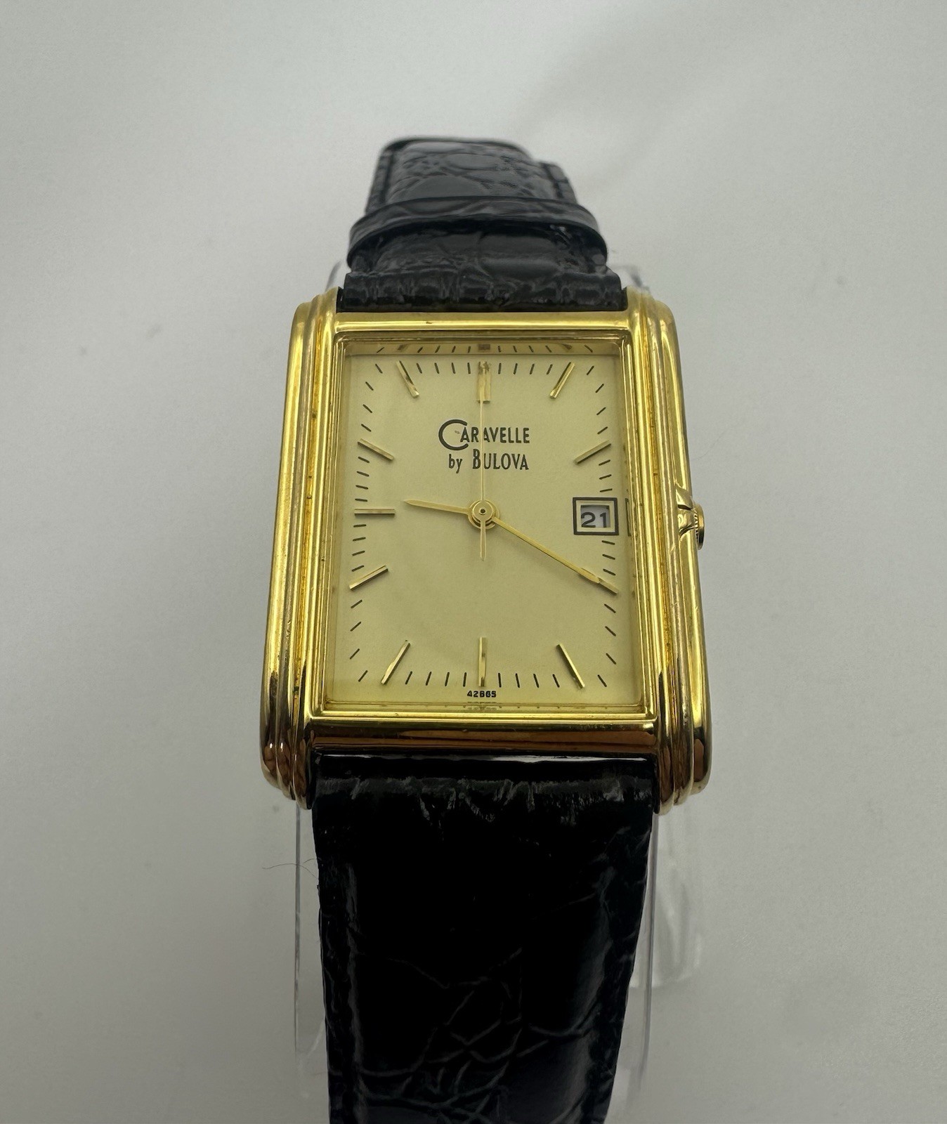 Caravelle by Bulova Quartz Gold Tone Rectangular Date Dress Watch – Running