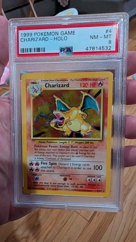 1999 POKEMON BASE SET UNLIMITED #4 CHARIZARD-HOLO PSA 8