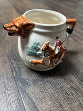 This item is a vintage milk jug made by PPC England (Paramount Pottery Company)