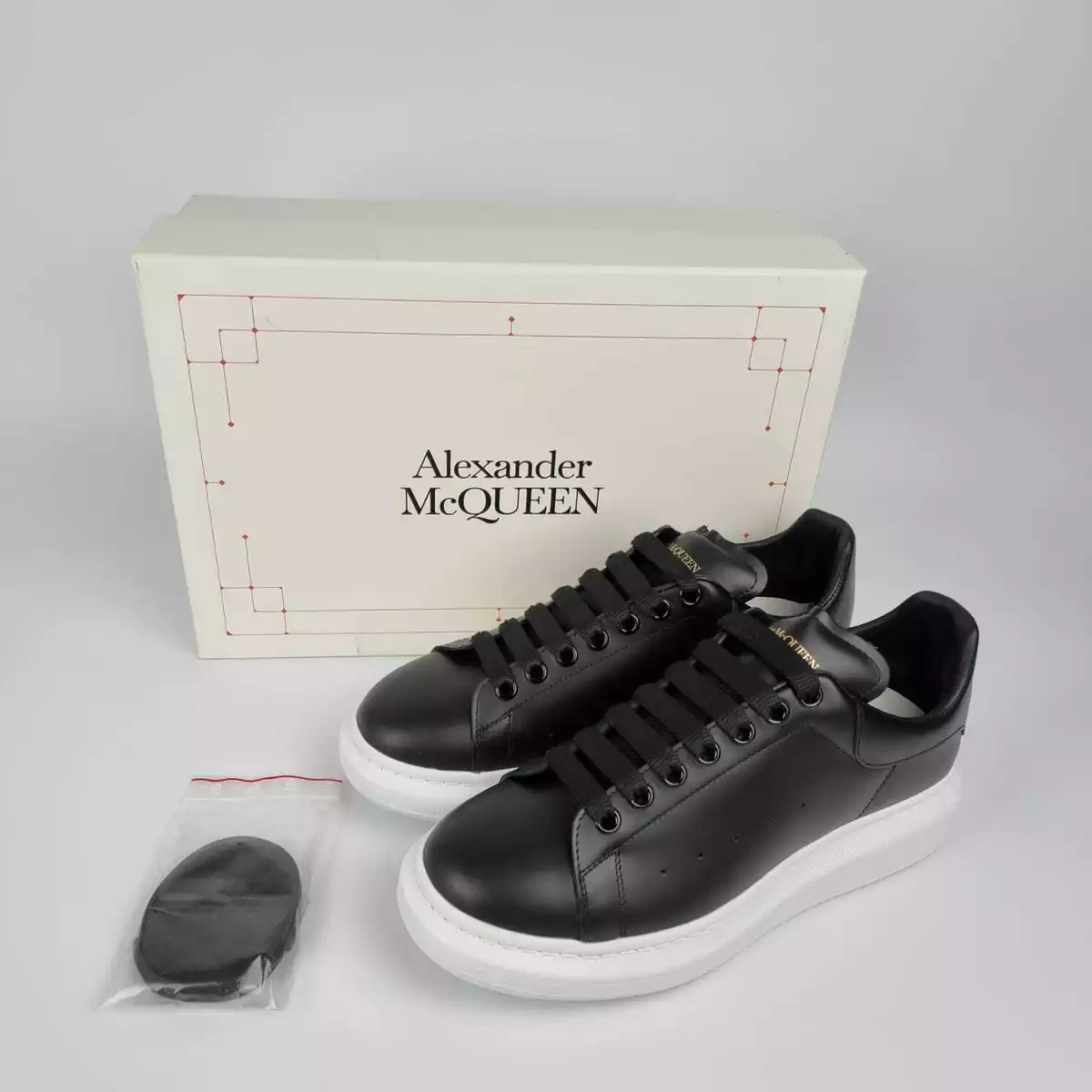 Oversized Leather Sneakers in Black - Alexander Mc Queen