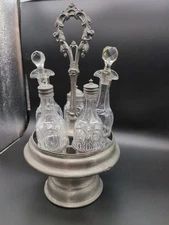 Antique cruet Five Bottle Set.