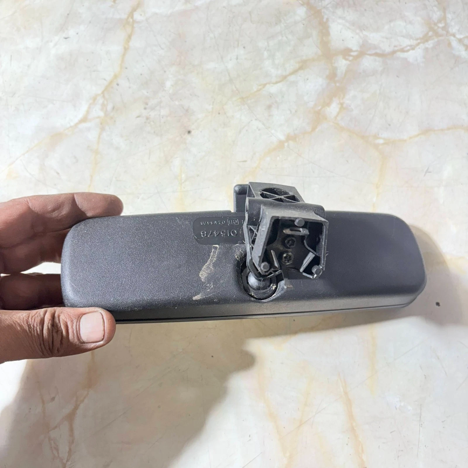 Actual interior mirror rear and mounting foot
