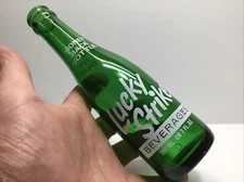 7 Oz. Lucky Strike ACL /Painted Label Ginger Ale Bottle. Nashua N. H.