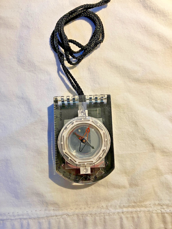 Brunton mirrored sighting compass with declination scale and pouch, made in USA