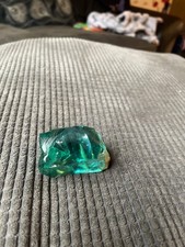 Used green obsidian that was dug up