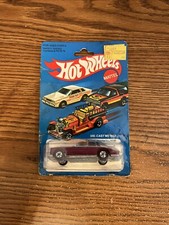 Hot Wheels Cadillac Seville #1698 Gray and Purple 1982 Release MOC
