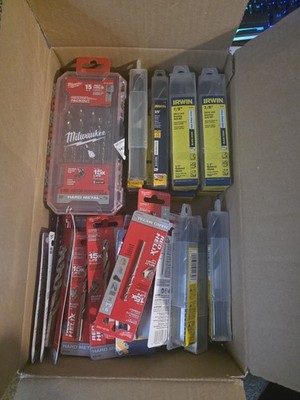 BOX OF ASSORTED DRILL BITS AND KITS. NEW IN PACKAGING, SIZE RANGES 3/32'' - 1''