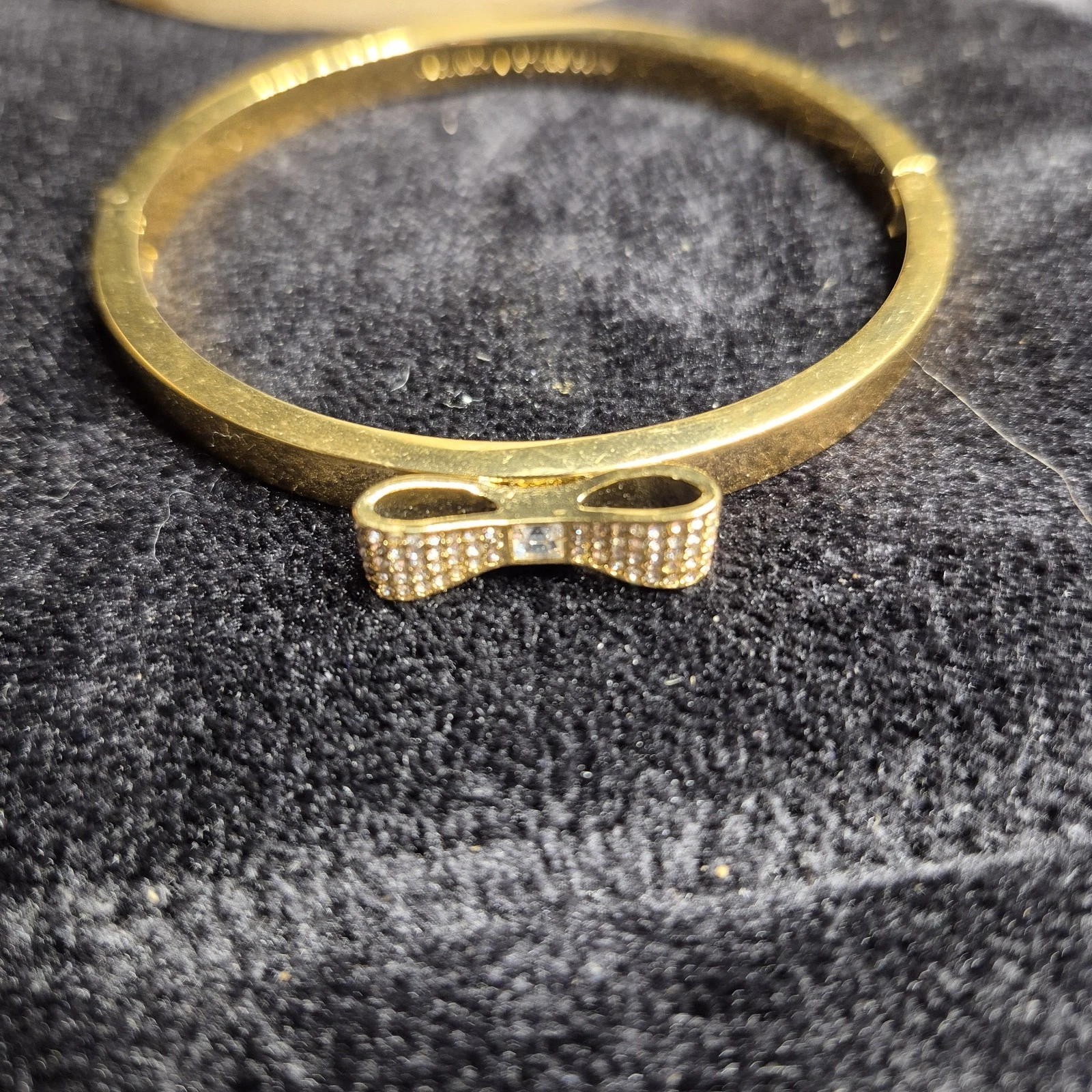 Bracciale donna Kate Spade New York tono oro prendi un fiocco cerniera