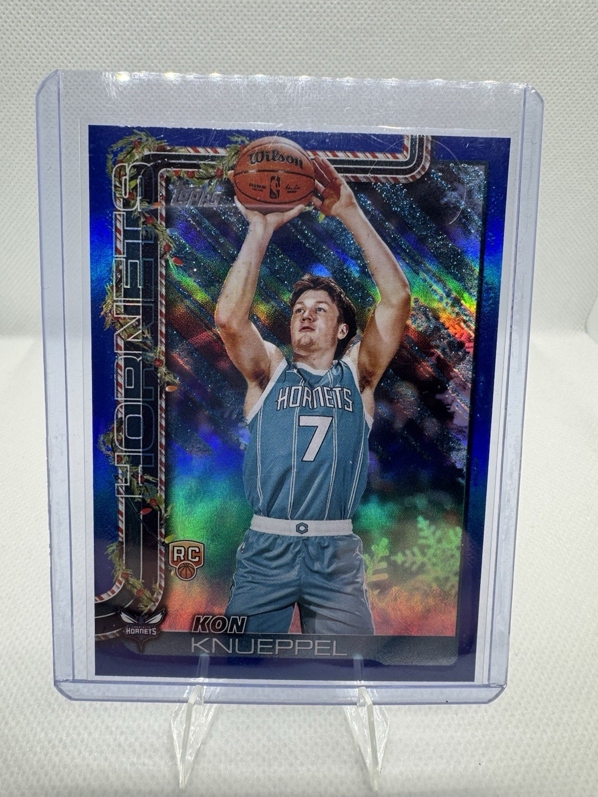 2025-26 Topps Holiday Kon Knueppel Blue Metallic Glitter Parallel (RC) #H164