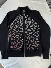 bebe 2 piece set. Top   size XS, bottom  size S. In this set, the top is new.