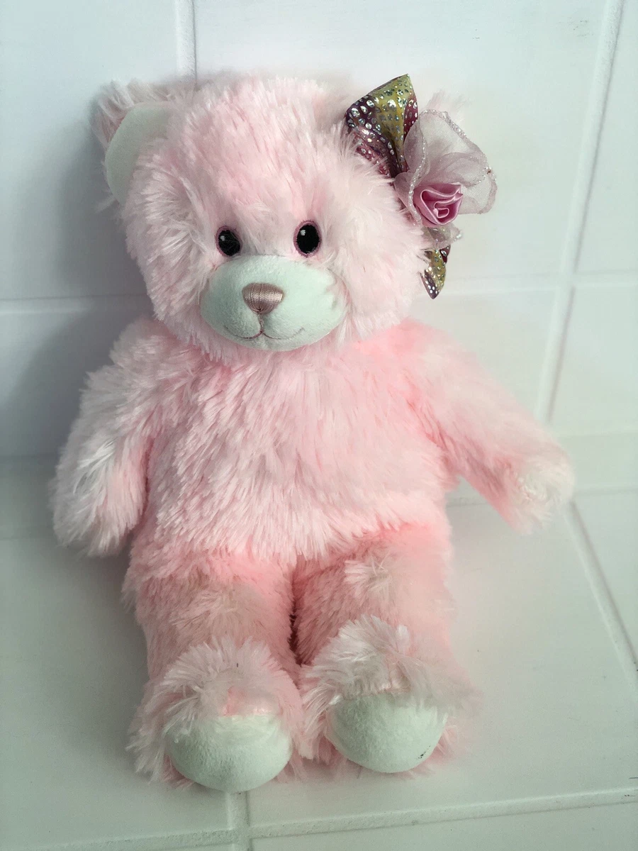 Pink cuddles build sales a bear